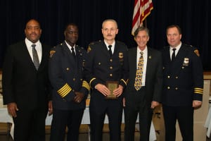 Left to Right : Community Relation's Executive Director Blaine Griffith, Lt. Frank Bolon, Cleveland Police Foundation Board Member James Craciun, and Second District Commander Thomas Stacho.