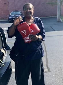 Officer Maurice Hamilton donation of boxing gloves