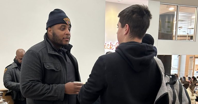 Officer and Student Talking at CSU