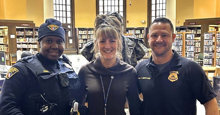 Commander Maffo-Judd and Officer Lavender with Branch Manager Angela Guinther.