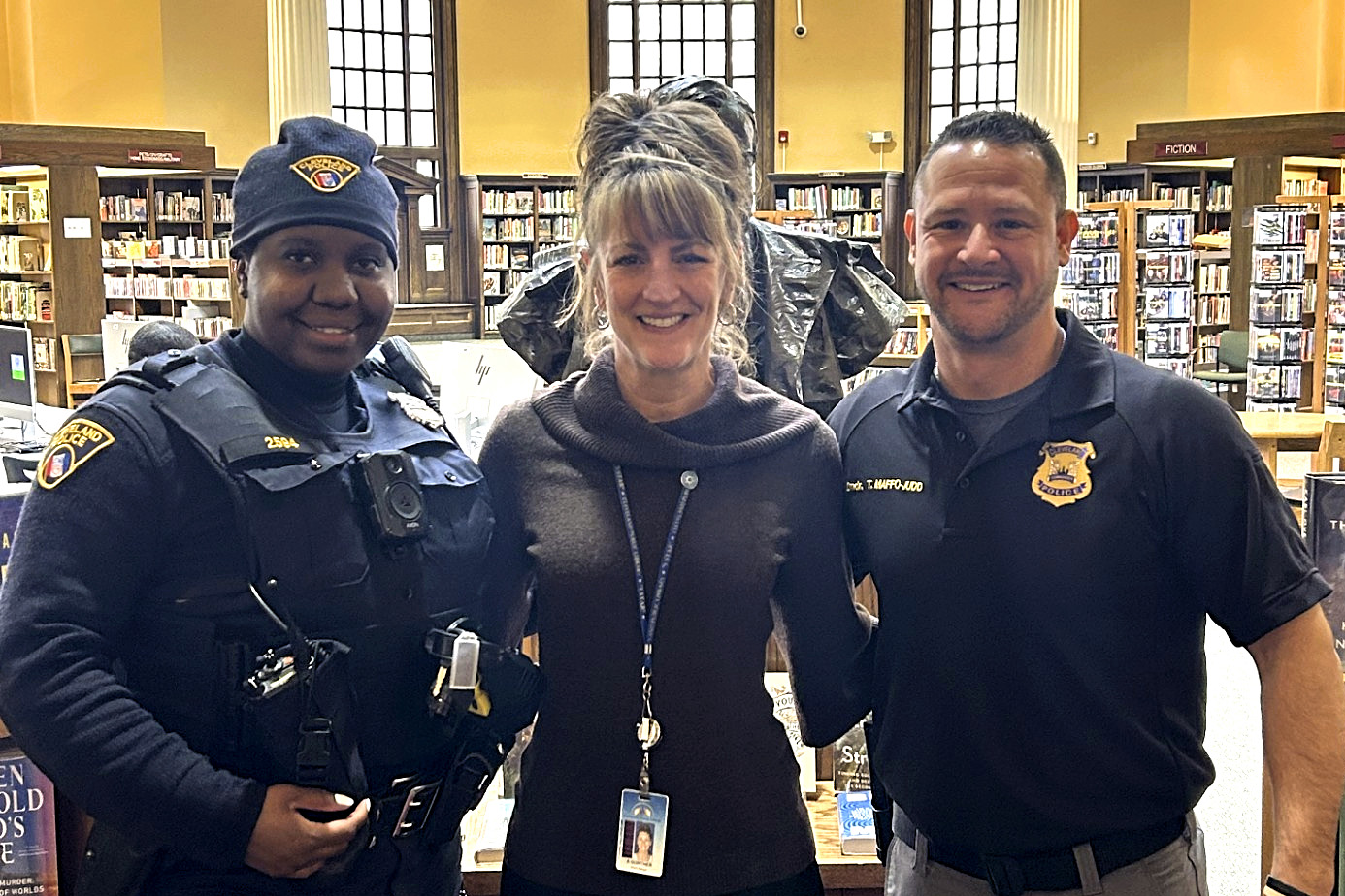 Commander Maffo-Judd and Officer Lavender with Branch Manager Angela Guinther.