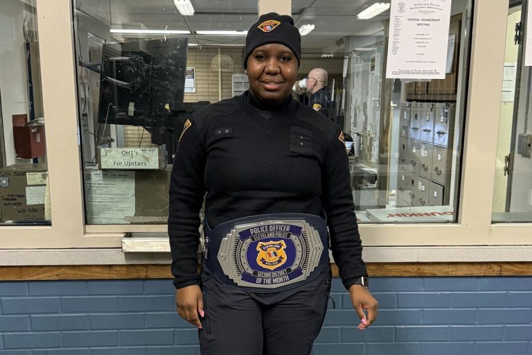 2nd District Officer of the Month Lavender with her championship belt