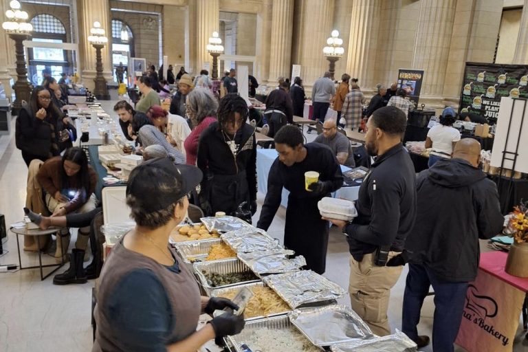 Tables and participants at the City Hall Vendor Fair