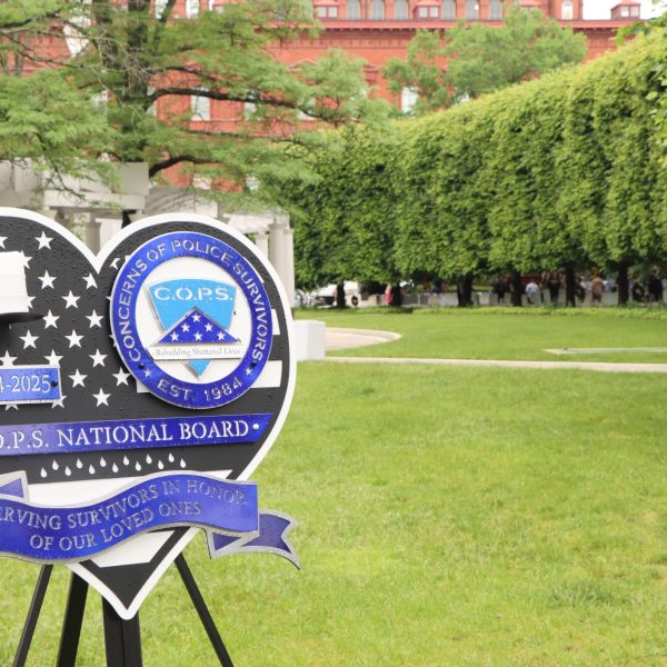 Memorial tribute sign from the C.O.P.S. National Board honoring police survivors and their loved ones