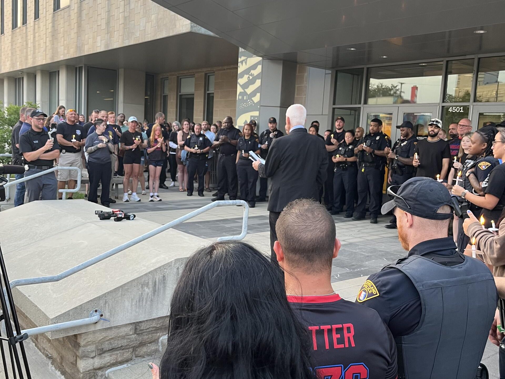 Officer Jamieson Ritter Vigil 2 A crowd of officers and community members gathers outside the 3rd District for the vigil honoring Officer Jamieson Ritter.